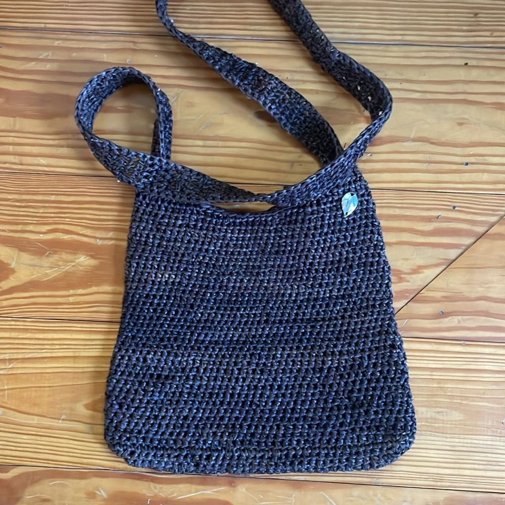 Kaminski “flat bag” wild raffia